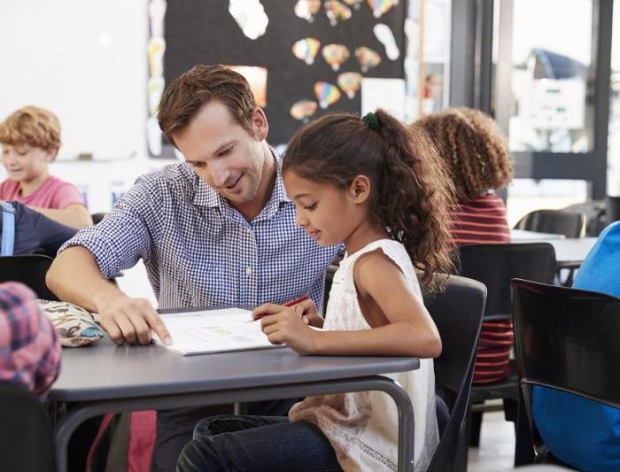 male teacher with student