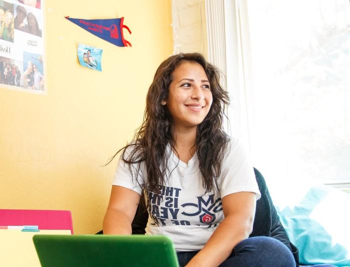 Saint Mary's Accounting Minor Student Studying in Dorm