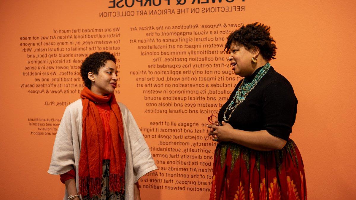 a museum staff and student having a conversation at the Museum of Arts at SMC